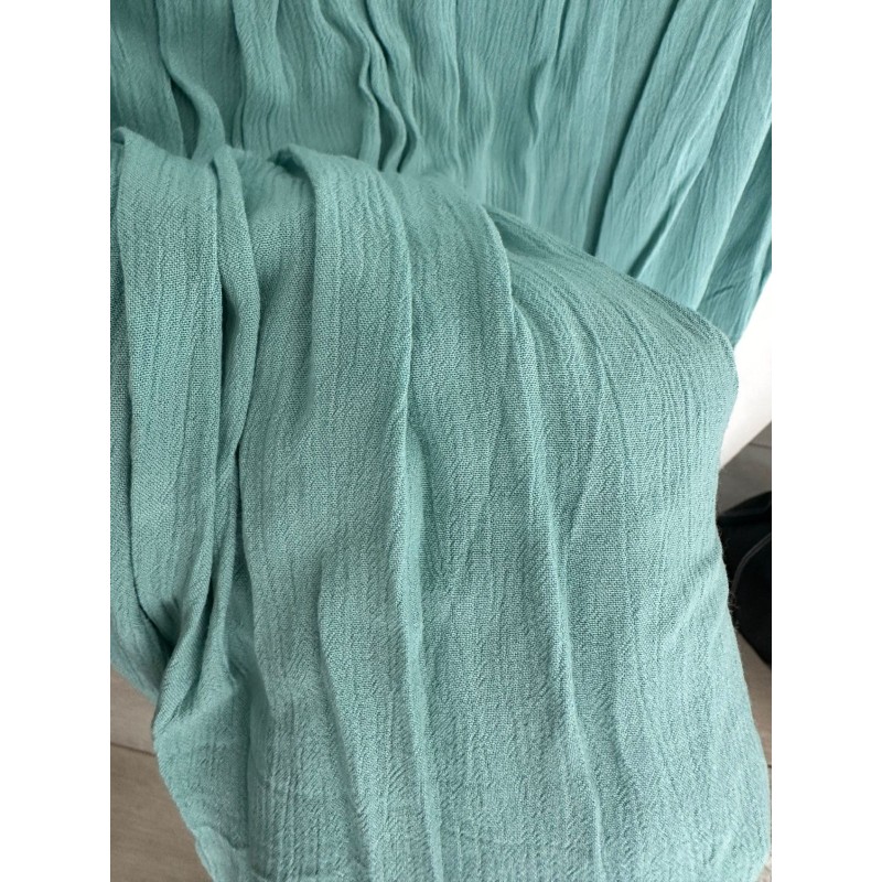 Robe turquoise smockée été